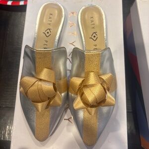 Katy Perry bow slip ons